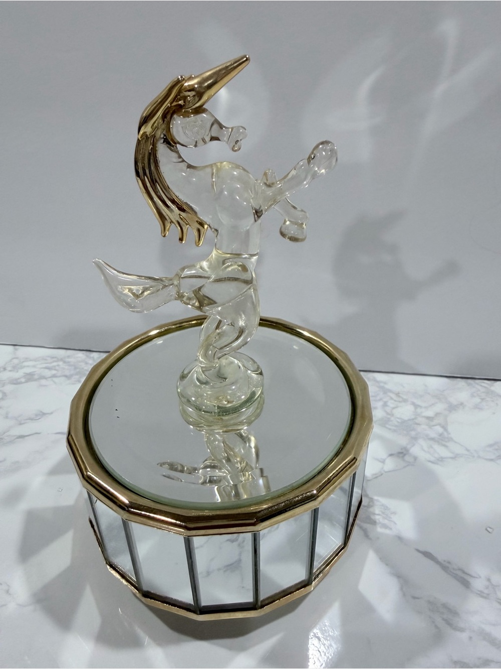 Vintage  unicorn with golden mane on mirrored music box, plays "Love Story”